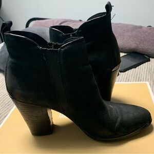 Michael Kors Black Heeled Boots with Classic Silhouette
